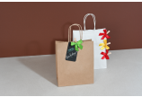Tragetasche aus Kraftpapier mit gedrehter Kordel