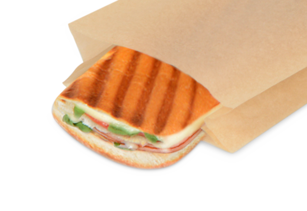 Brot erhält im Kontaktgrill durch das Papier hindurch Grillstreifen